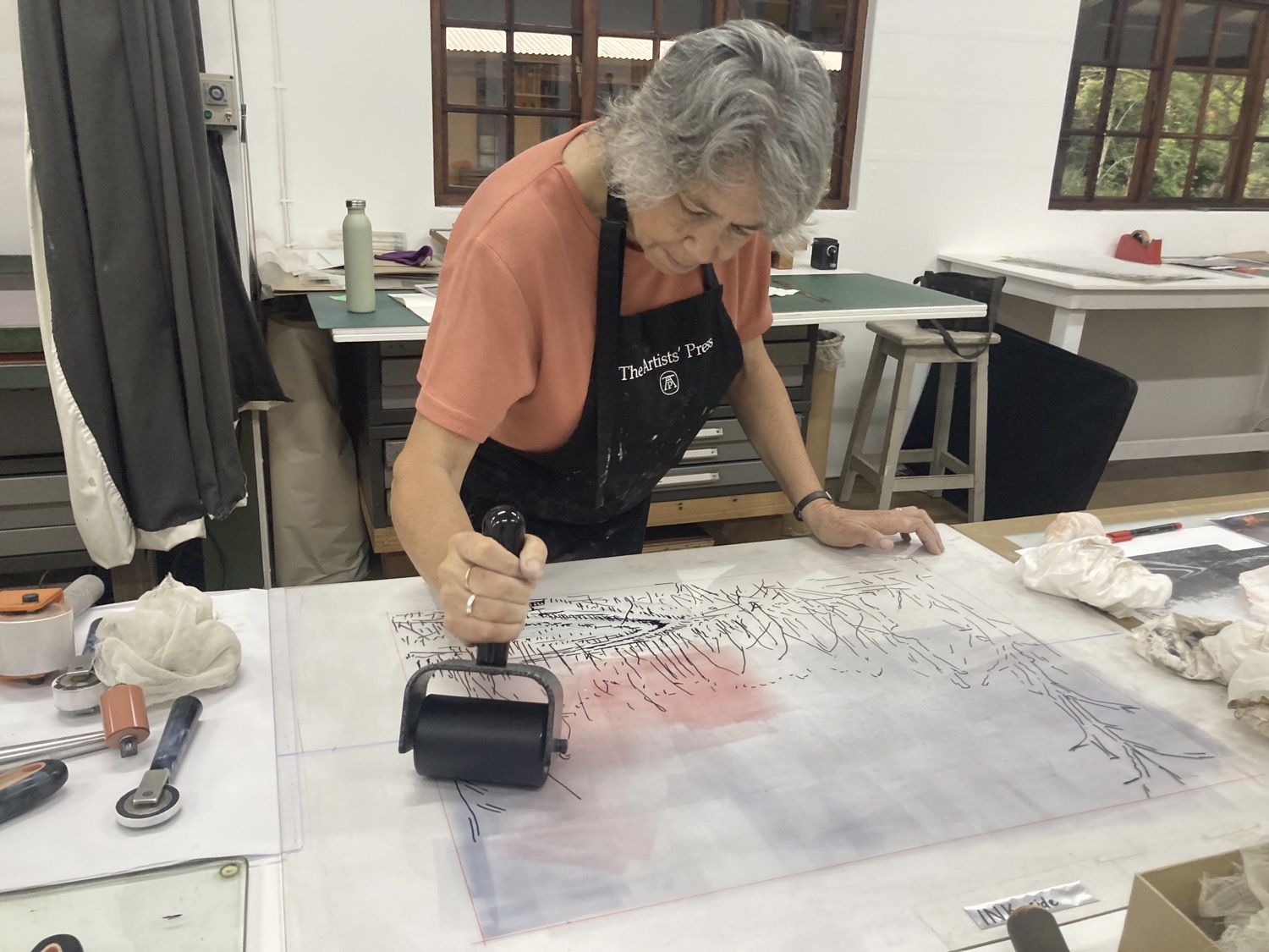 Kim Berman working on monoprints at The Artists Press